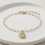 Pulseira pérolas búzio 